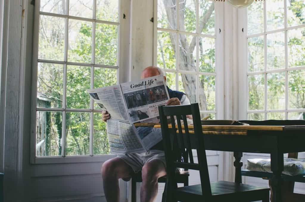 senior citizen reading about annuities
