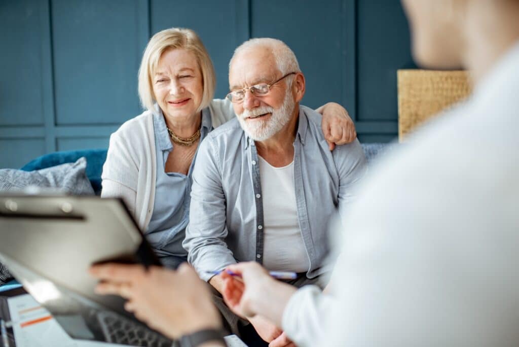Older couple implementing tax strategies with tax advisor