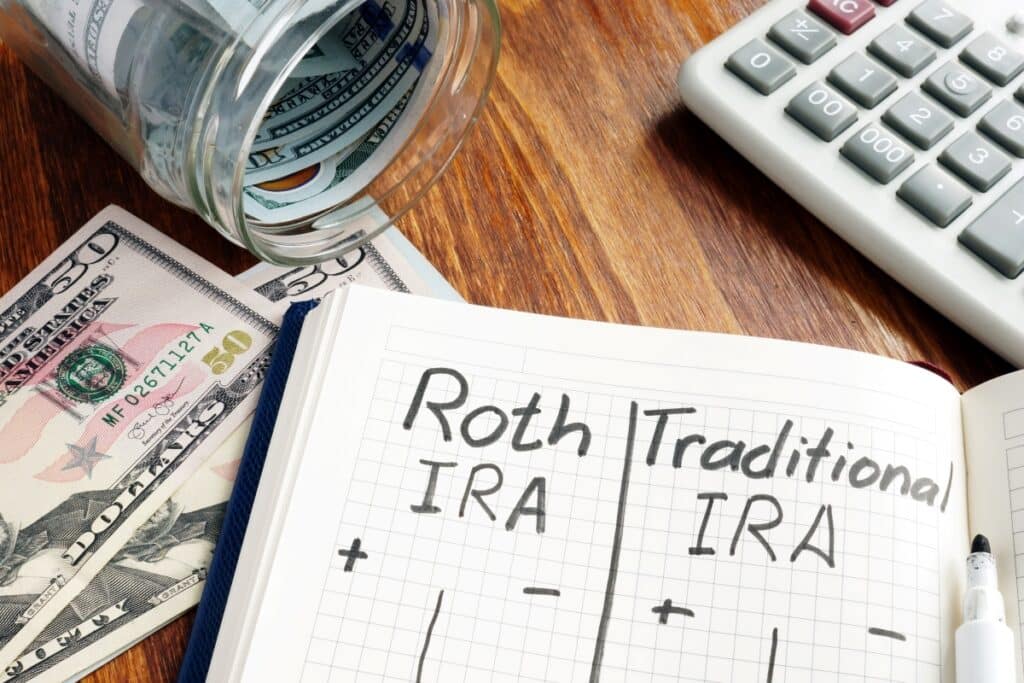 Roth IRA vs Traditional IRA written on notebook