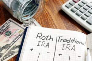 Roth IRA vs Traditional IRA written on notebook